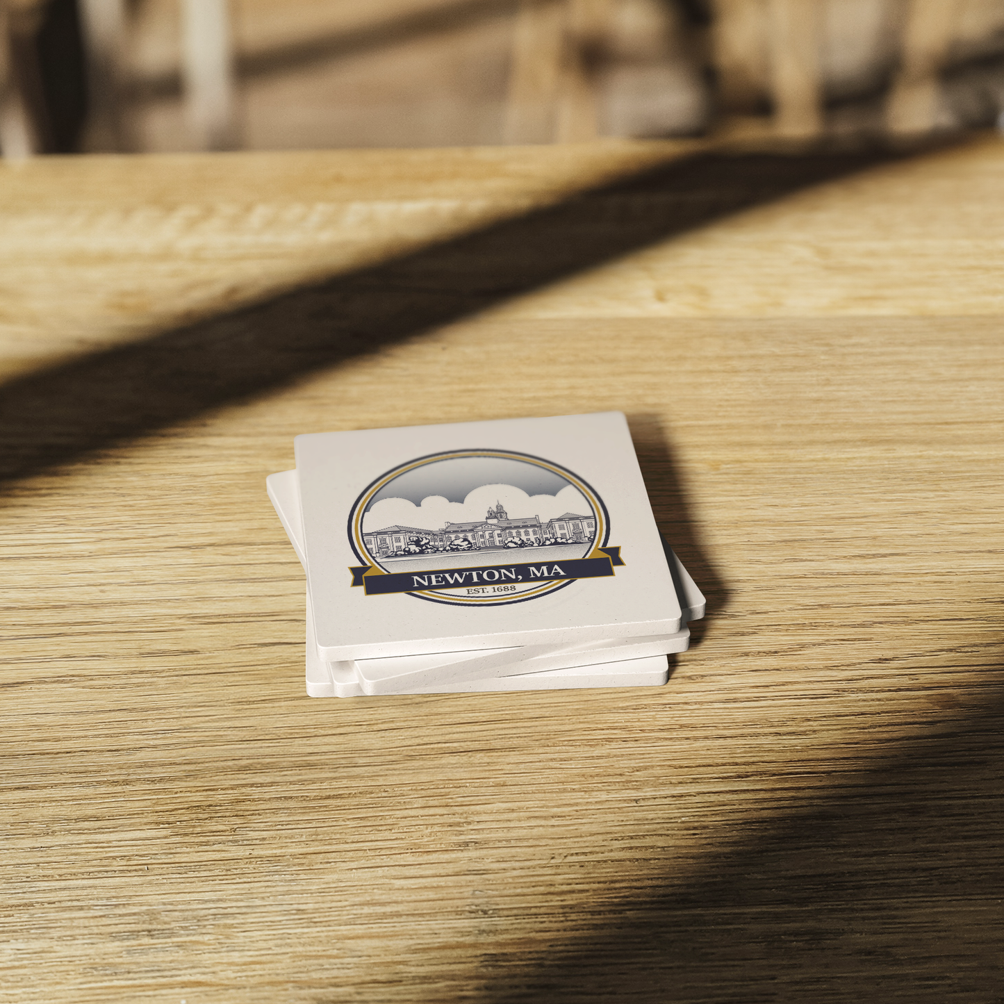 Newton_City_Hall_Stone_Coasters_SquareStoneCoaster_WoodTable_AS_Mockup.png